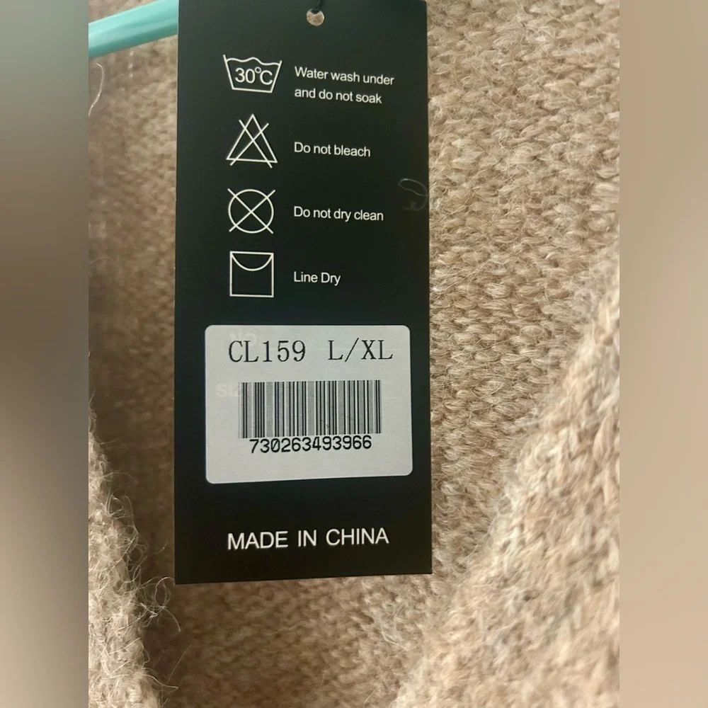 S. Christina Beige Cardigan with Black Spiral Accents